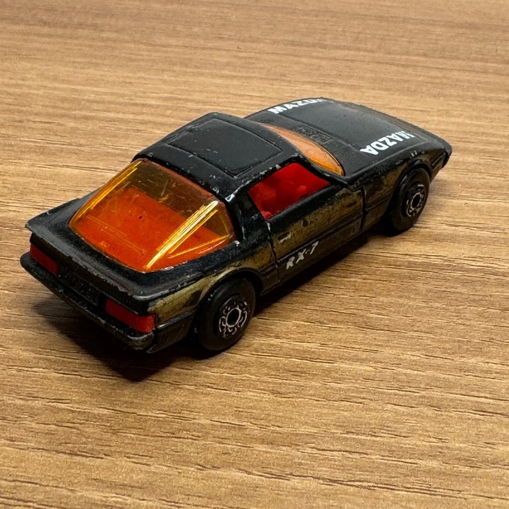 Vintage 1980s matchbox Mazda RX-7 Toy Car Black Diecast Collectible doors open‎